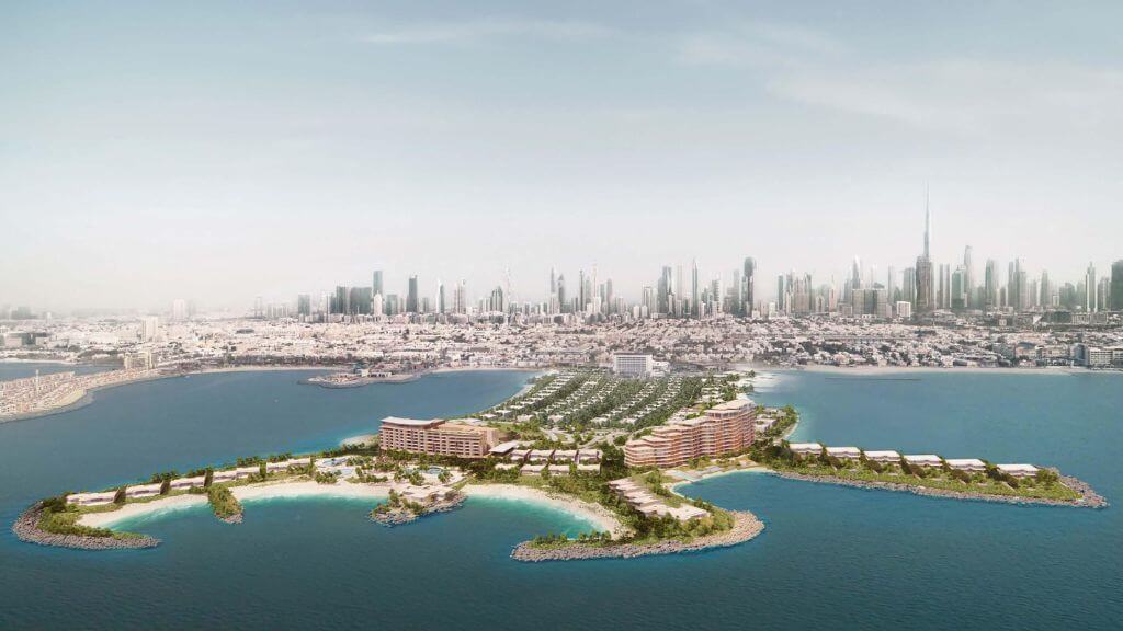Jumeirah Asora Bay Location Master Plan | La Mer South Dubai Aerial view of Jumeirah Asora Bay beachfront development in La Mer South, Dubai with Downtown skyline in background.